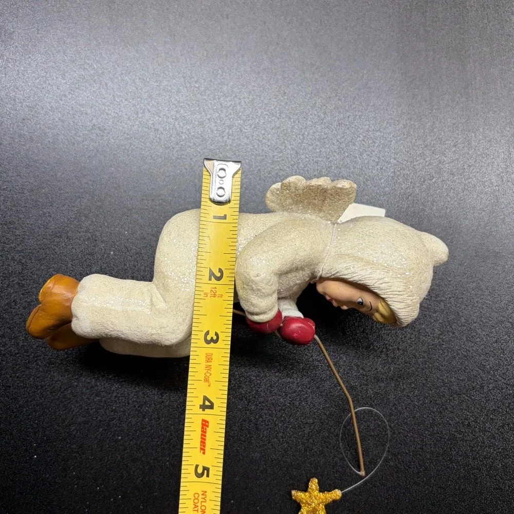 Midwest of canon falls shelf angel with fishing pole & star on the end figurine